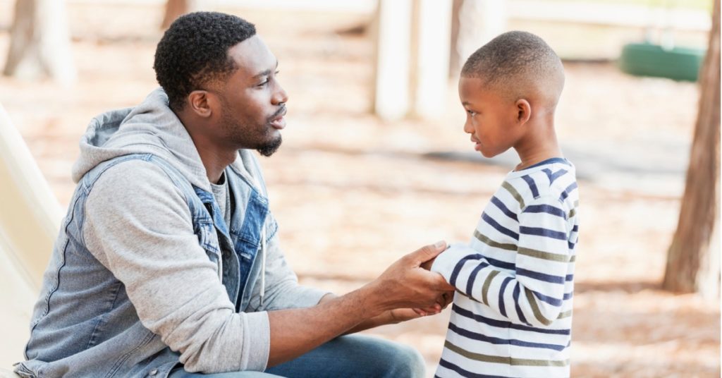 father-talking-to-young-boy-1024x536